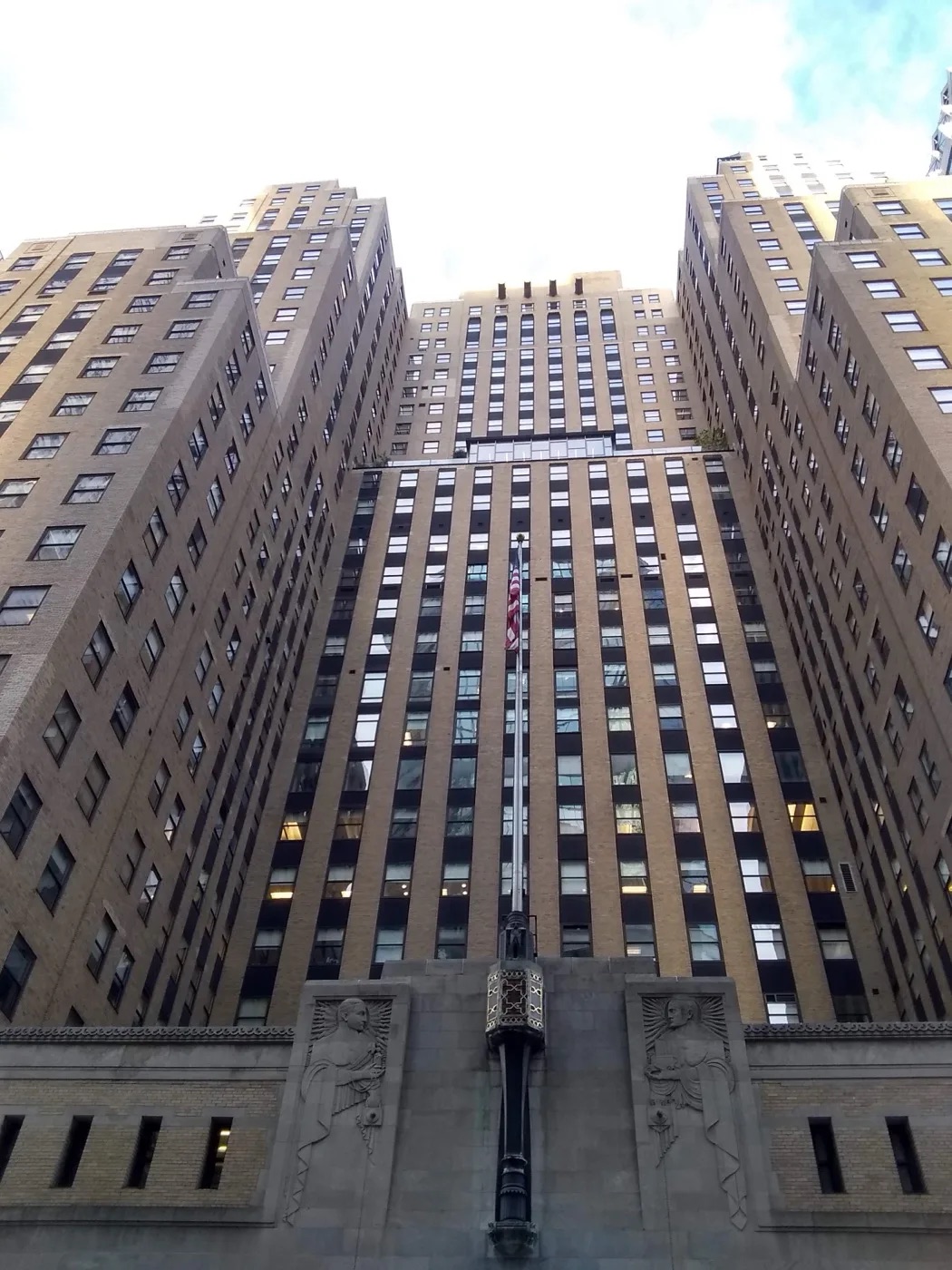 The Graybar Building exterior at 420 Lexington Avenue in Midtown Manhattan, photographed from street level. The facade's bronze caduceus and ornate art-deco detailing are visible at the entrance.